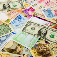 What is foreign currency trading