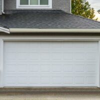 Vinyl and wooden garage door choices for modern houses